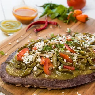 a tortilla on a cutting board