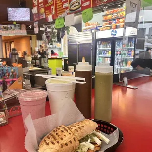 a sandwich and a drink at a fast food restaurant