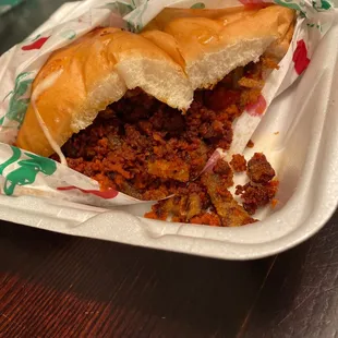 a sandwich in a styrofoam container