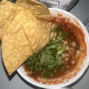 Salsa (spicy) and chips (super good)