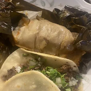 a closeup of a taco with meat and vegetables