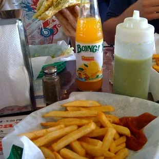 some fries and a nice bottle of mango flavored BOING!