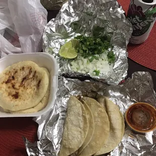 Pupusas and beef tripas tacos