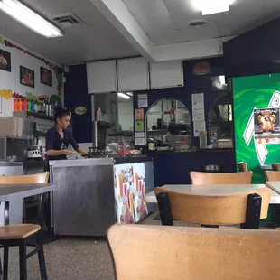 a woman behind the counter