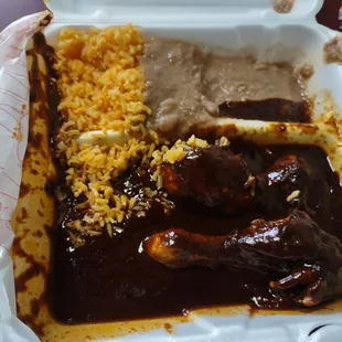 Two tiny  legs hardly any rice and the beans and rice and everything was all mixed together and they charge extra for credit card