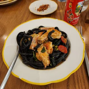 Squid ink bucatini with prawns