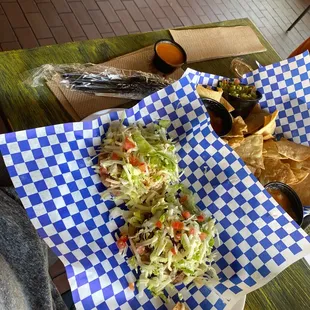 Two tiny ass tostadas for $11 this place is nuts!