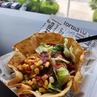 Tortilla Street Food Truck  Mexican Street Taco Bowl: Ground Beef, onion, peppers, corn, Mexican rice, lettuce &amp; mild salsa