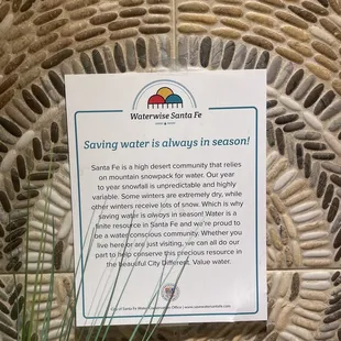 a sign stating that water is always in season