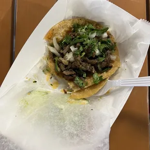 Steak taco (minus a bite)