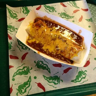 a hot dog in a paper container