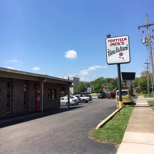 Sign and front door to the restaurant.