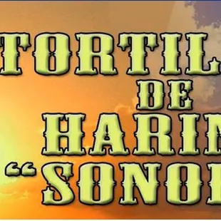 a silhouette of a man holding a sword