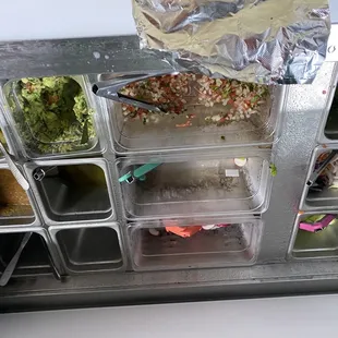 Burrito with the available toppings.