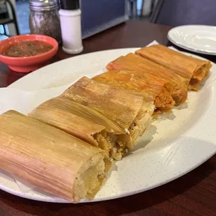 Tamales! $8 for half a dozen. We got three chicken and three pork with jalapeño.