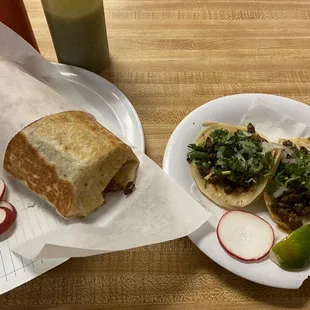 Carne Asada burrito and two Carne Asada tacos. Eh.
