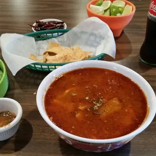 The menudo, chips, and Coke.