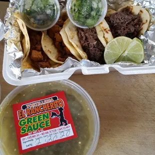 Al Pastor and Carnita Tacos with a medium Green Salsa