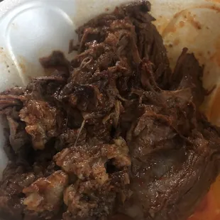 1/2lb of barbacoa. Also very good