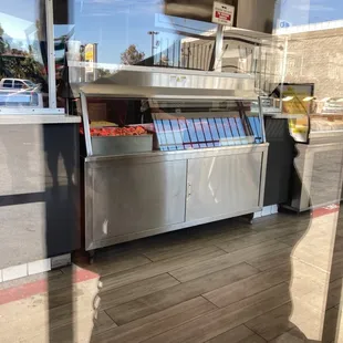 the reflection of a person in the window