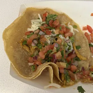 Taco with chicken, onion (could not detect), cilantro, pico, cheese (BARELY). Disappointing.