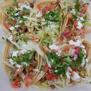 $1.25 Taco Tuesday deal.  Asada, carnitas &amp; al pastor.