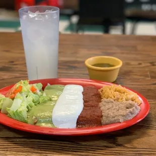a plate of food and a glass of water