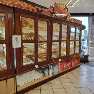 a display case filled with pastries
