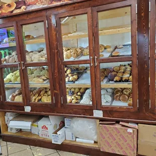 a display case full of pastries