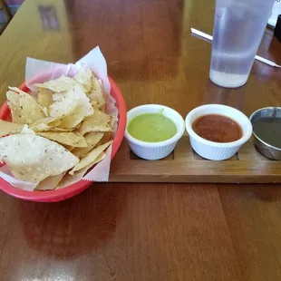 Homemade chips, really like their green salsa and black bean dip