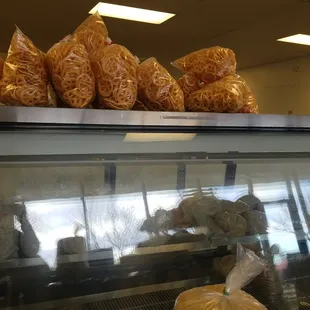 a display case filled with tortillas