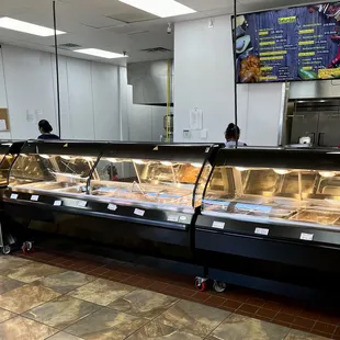 All the meats and sides on the hot bar.