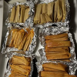 A plethora of tamales  and were freaking hot even to handle, love it! Bean, pork, &amp; chicken tamales !