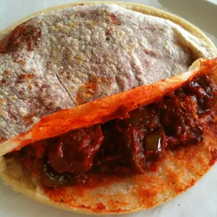 Fantastic gordita with pork and cactus.
