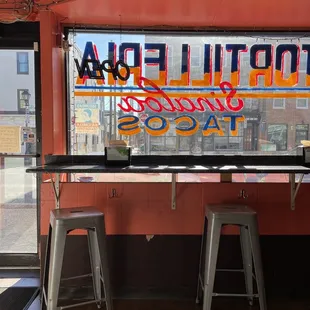 a bar with stools