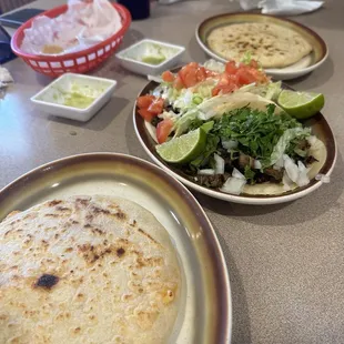 Two pupusas and two tacos