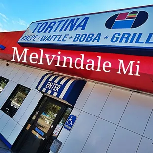 the front entrance of a restaurant