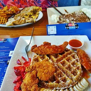 a plate of fried chicken and waffles