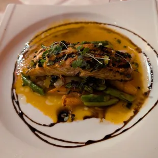 Salmon with carrots, asparagus, scallions and white sambuca sauce. Yummy.