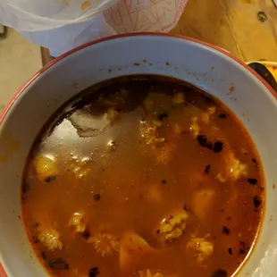 a bowl of soup on a table