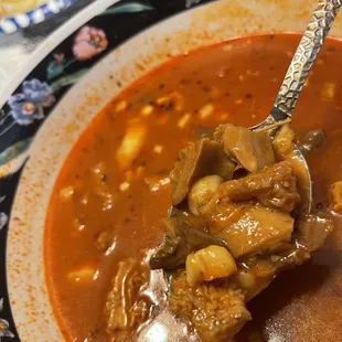 Dark over heated honey comb menudo meat.