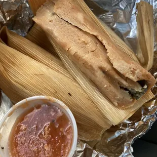 Jalapeño cheese tamales with red sauce.   (Not hot-to me)