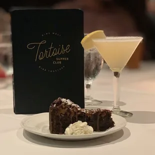 a chocolate cake and a martini