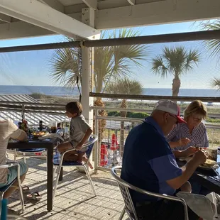 Balcony seating overlooking the beach