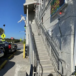 Outside of the Sliders Restaurant. These stairs are to Tortuga Jacks restaurant separate from Sliders. They also have an elevator inside