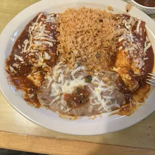 Enchiladas one cheese the other shredded beef.