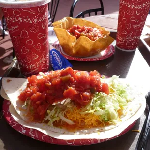 Front: a &quot;burrito&quot; is under there somewhere.  Back: taco salad