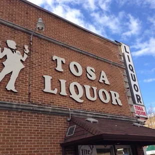 a sign on a brick building