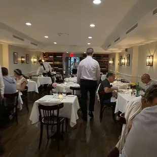 a group of people dining in a restaurant