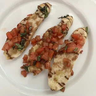 $10.00 to- go order of bruschetta.   Sad.  3 pieces of mushy bread with toppings